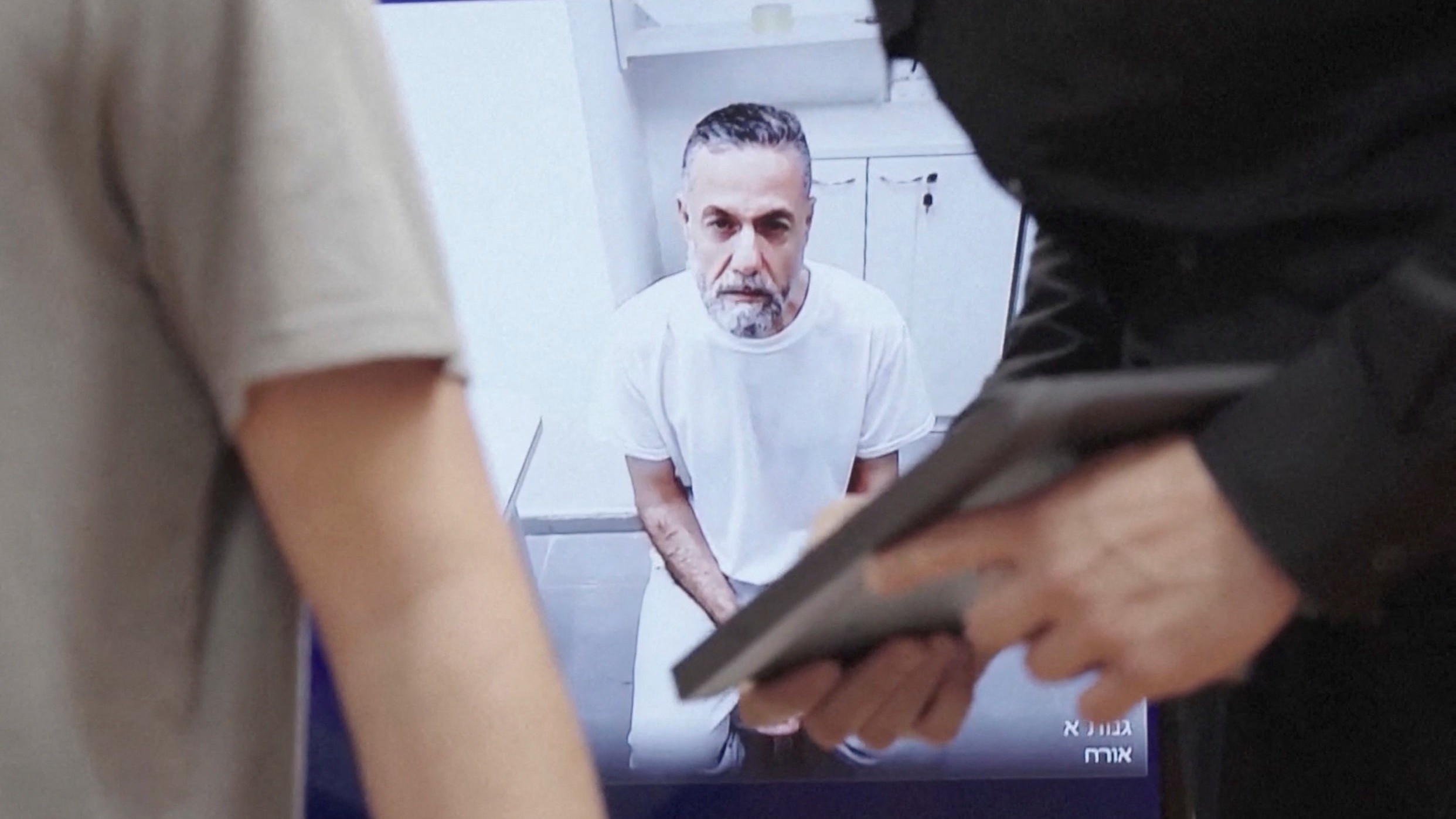 Abu Safiya appears via video link at the Israeli Supreme Court hearing in Jerusalem, 10 June 2026, (Reuters) 