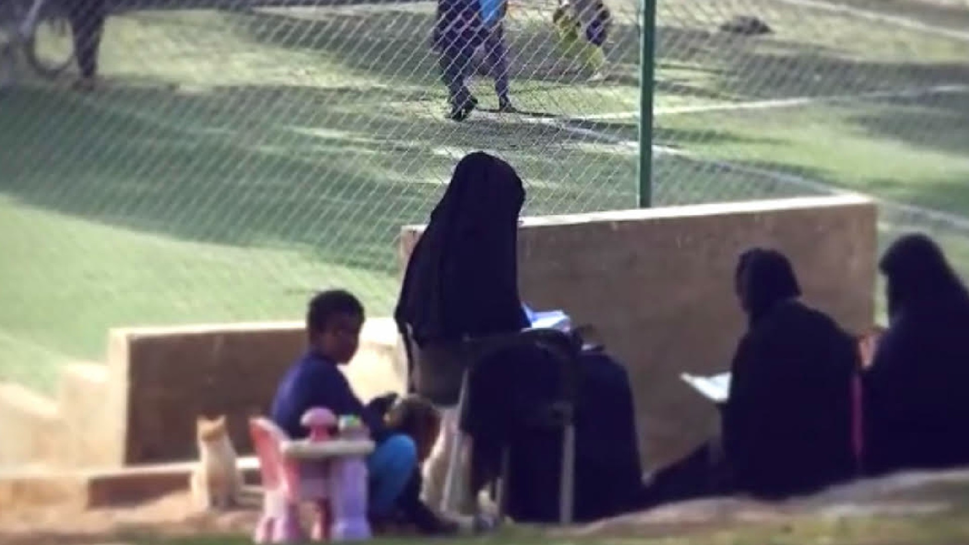 A screengrab from a propaganda video released by Omar Omsen group showing children and women living in the camp