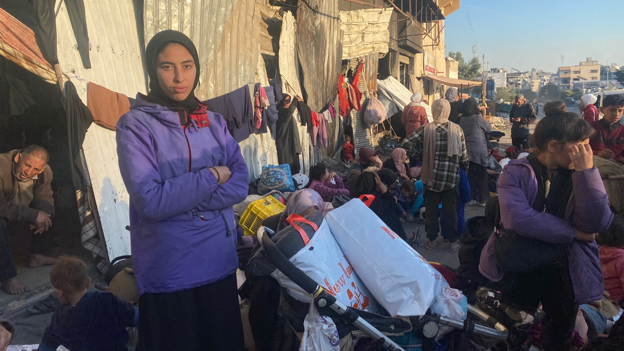 Linah Alradiya, 17, pictured at al-Wihda street in Gaza City before finding shelter at a relative's tent (MEE/Ahmed Dremly)