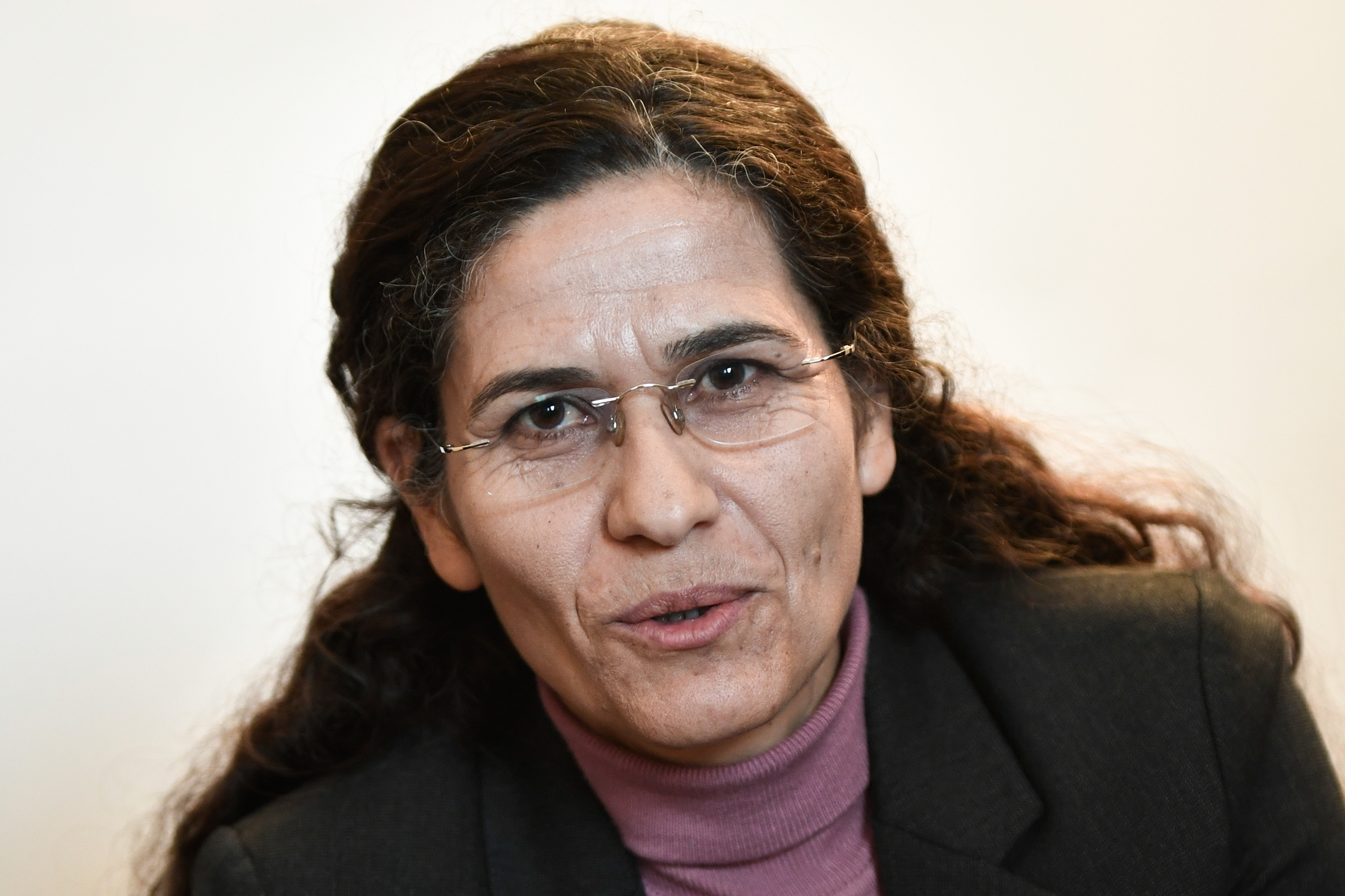 One of the two top political leaders of the Syrian Kurdish alliance and co-chair of the Syrian Democratic Council Ilham Ahmed delivers a speech during a press-conference, in Paris (AFP)