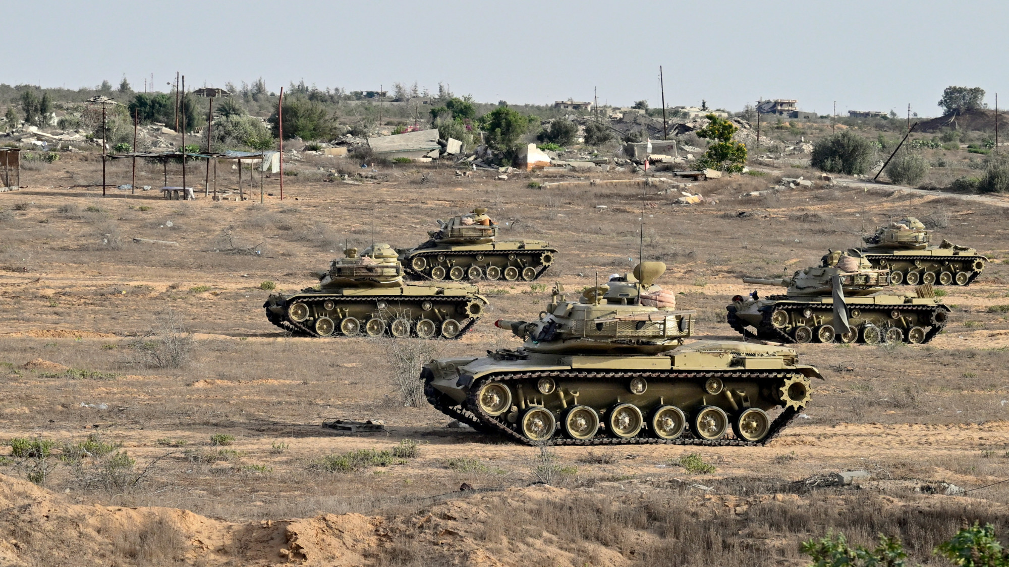 Egyptian army tanks are deployed along the border with the Gaza Strip on 4 July 2024 in el-Arish, in the north Sinai Peninsula (AFP)