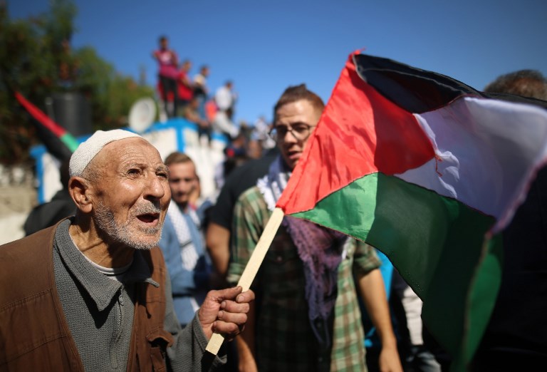 Protesters gather on the centenary of the Balfour Declaration in Gaza on 2 November 2017 (AFP)