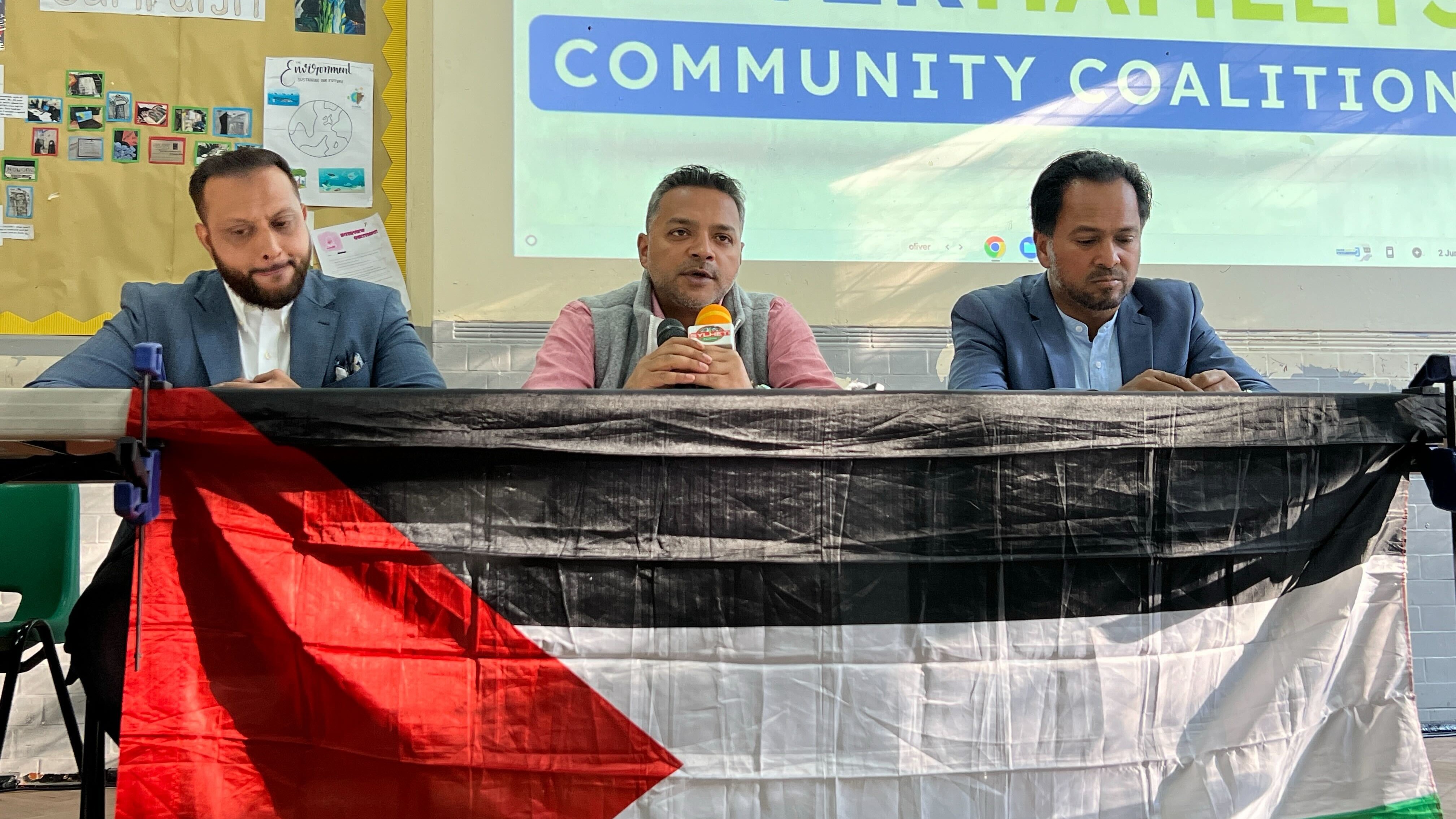 Tasnime Akunjee and Ajmal Masroor both hold a press conference announcing who will step down in the race to beat Rushanara Ali (MEE/Areeb Ullah)