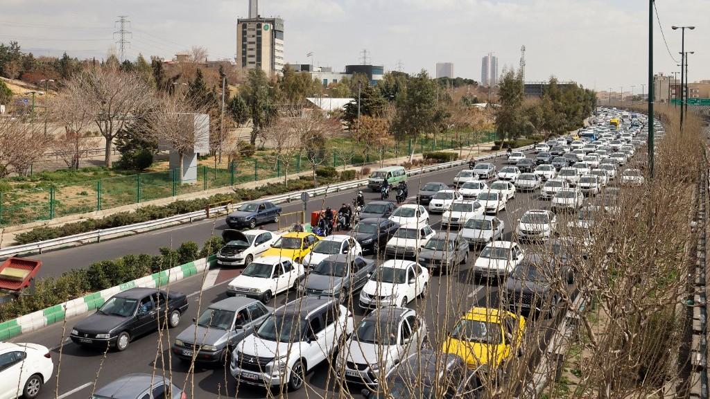 Motorists make their way along a street in Tehran on February 28, 2026 (AFP)