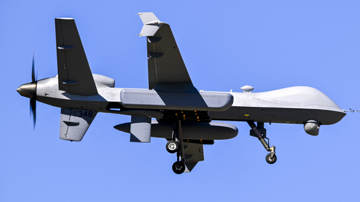 A US military MQ-9 Reaper drone approaches for landing at Rafael Hernandez Airport in Aguadilla, Puerto Rico, on 29 December 2025 (Miguel J Rodriguez Carrillo/AFP)