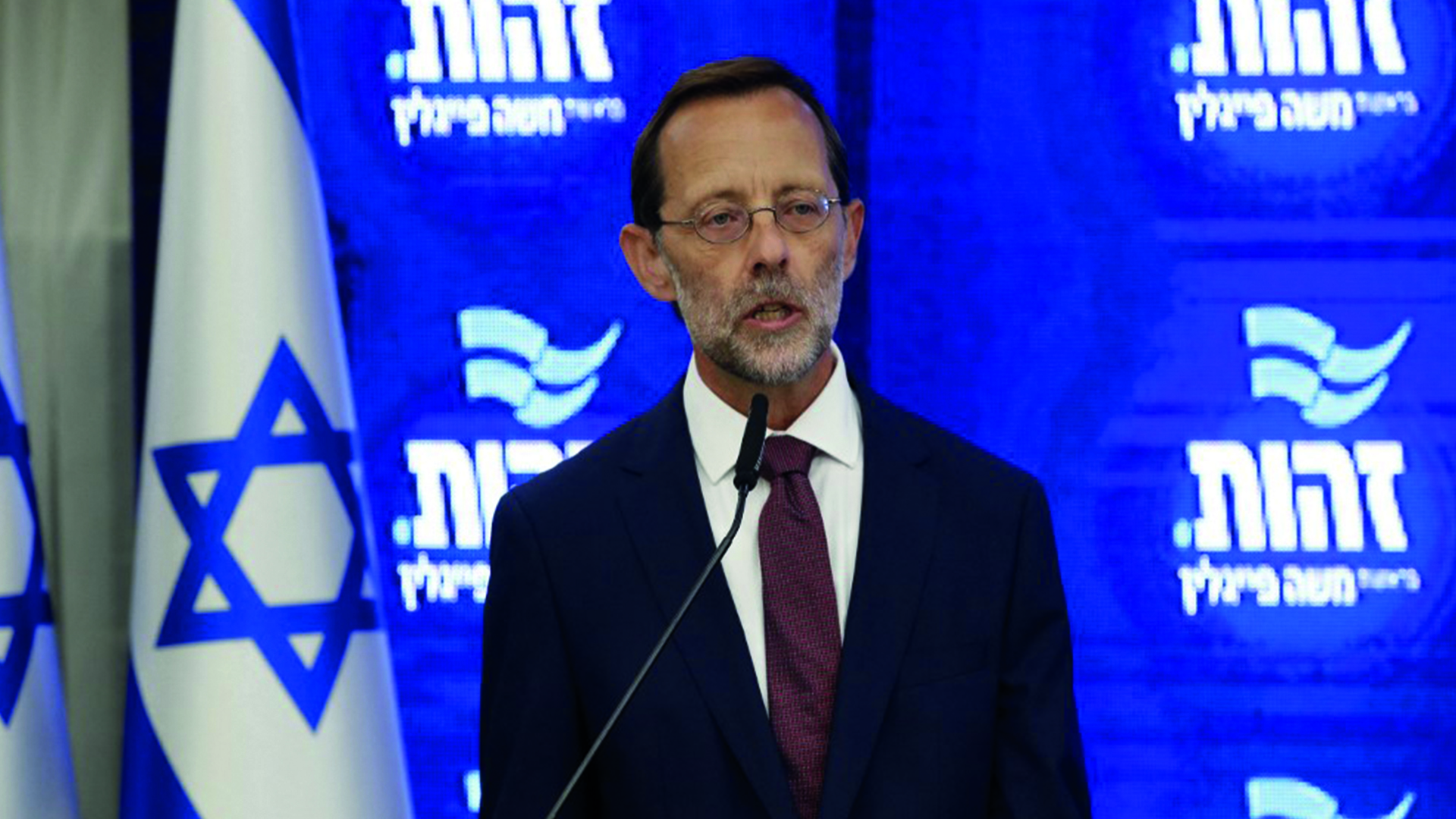 Israeli far-right Zehut (Identity) political party chairman Moshe Feiglin gives a joint press statement with Netanyahu (unseen) in Ramat Gan, near Tel Aviv, on 29 August 2019 (Jack GUEZ / AFP)