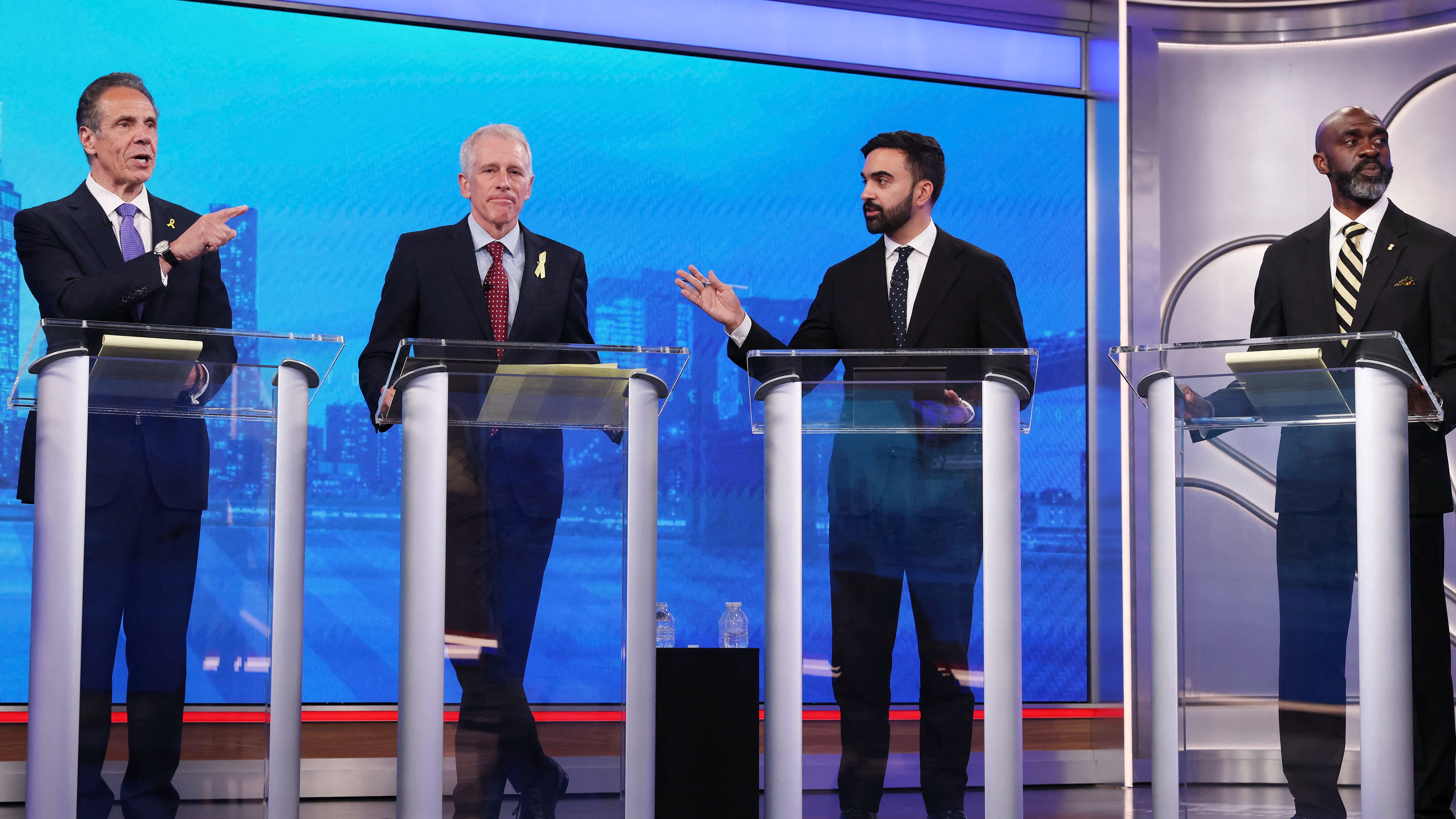 Left to right: Democratic mayoral candidates Andrew Cuomo, Whitney Tilson, Zohran Mamdani and Michael Blake during a Democratic mayoral primary debate in New York City, on 4 June 2025 (Yuki Iwamura/AFP)