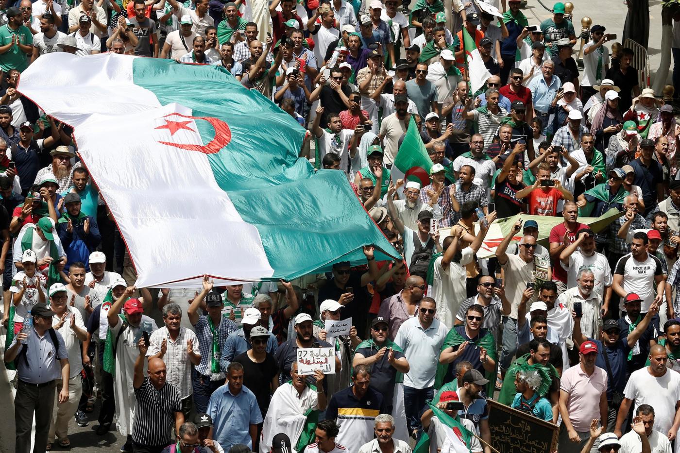 Protesters shout slogans against military chief Ahmed Gaid Salah in Algiers in 2019 (Reuters)