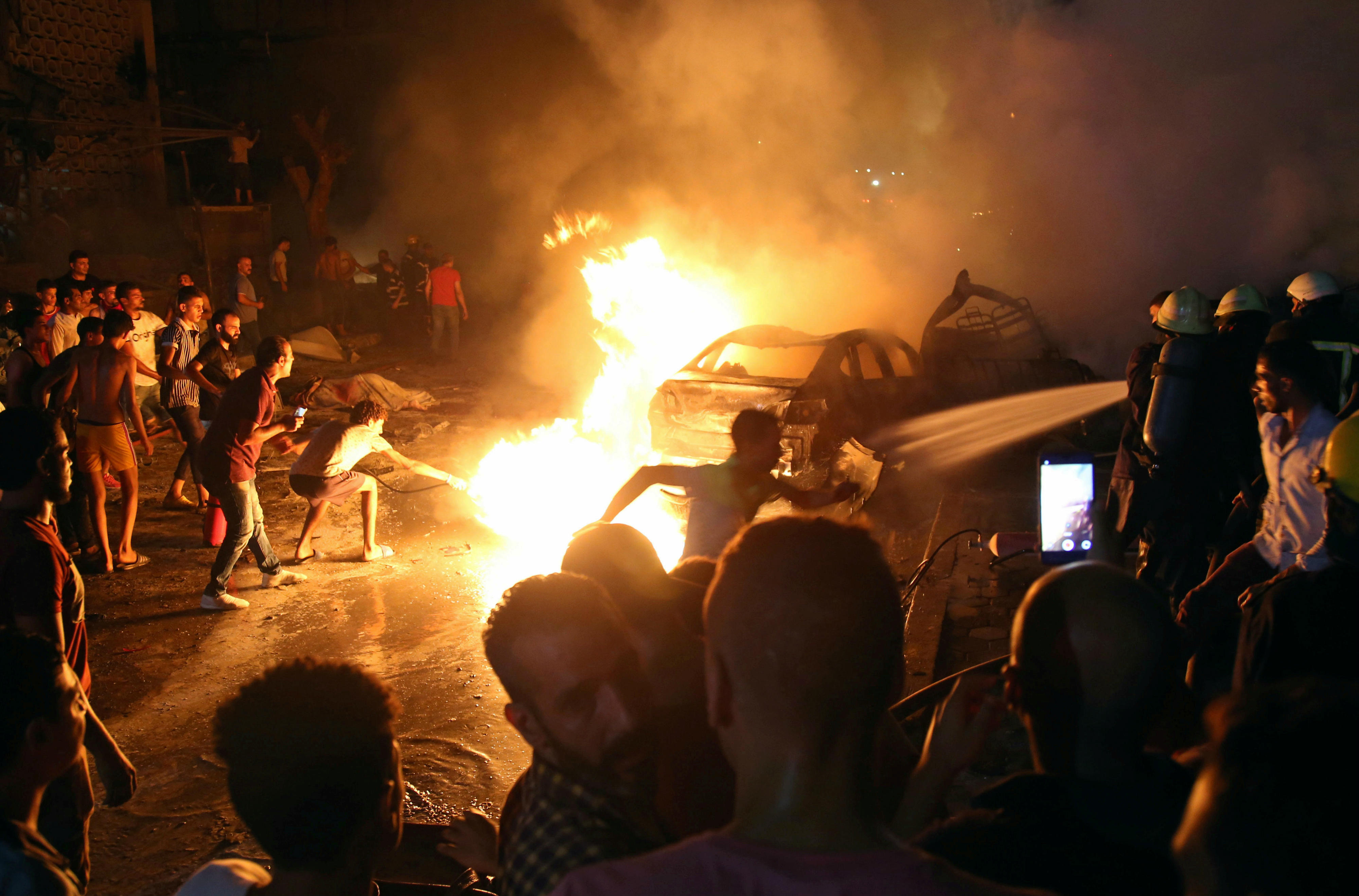 Social media users posted footage of the cars alight at the scene and of patients being evacuated from the Cancer institute (AFP)