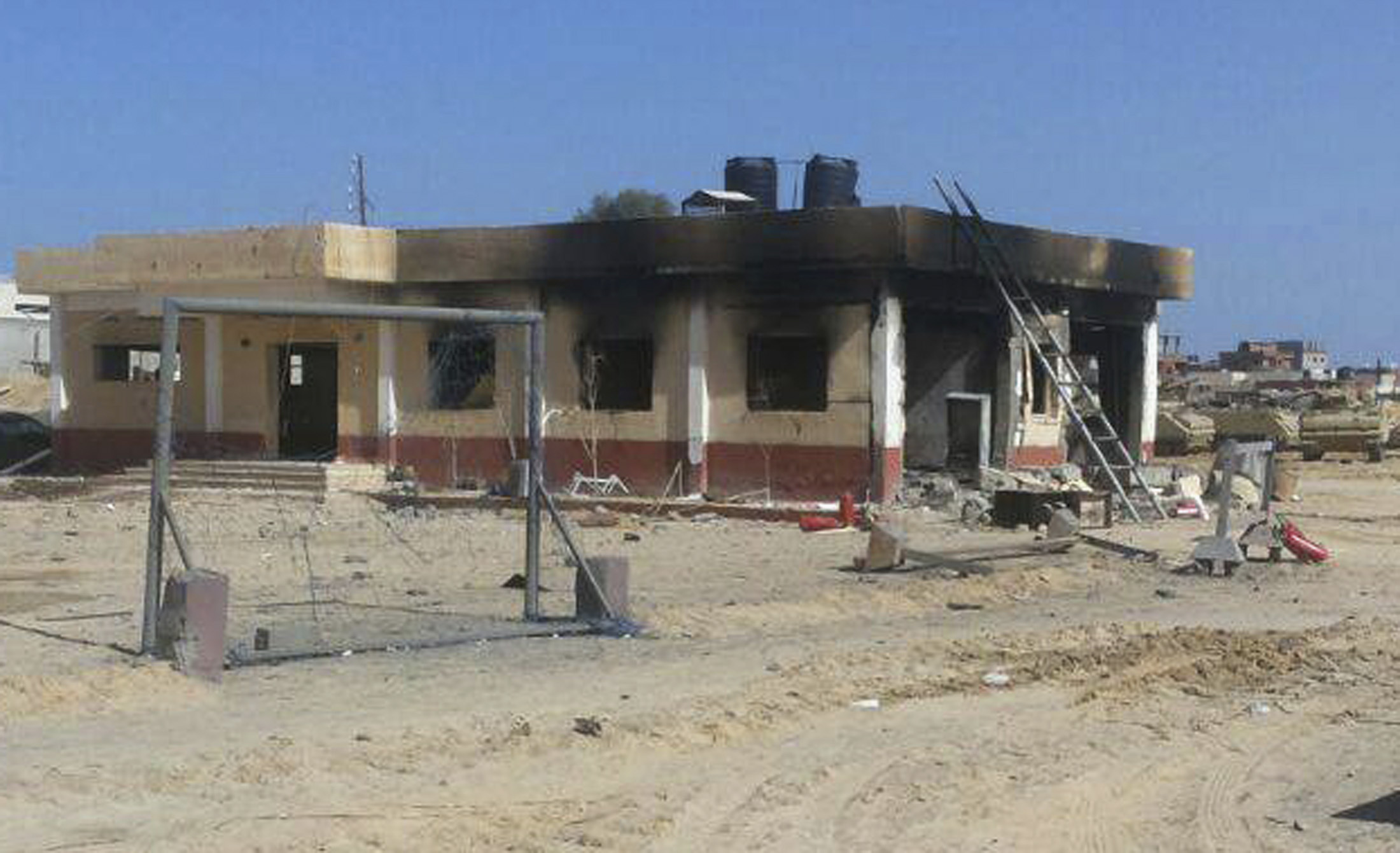 A damaged building at a location in northern Sinai Egypt in January 2015, where at least an least 30 soldiers and police officers were killed by Islamic State-allied groups (Reuters)