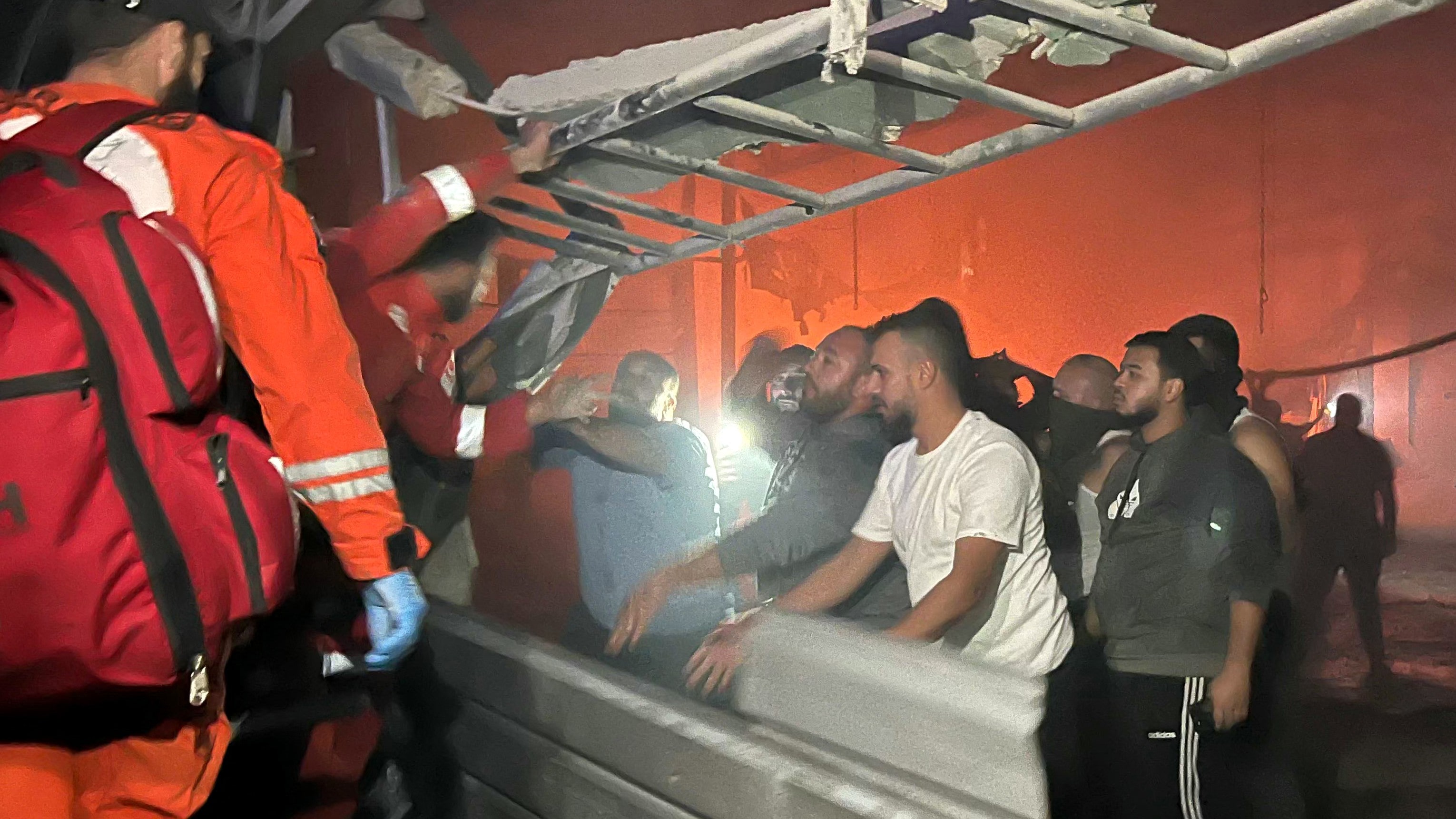 Rescue operations at the site of an Israeli drone attack targeting the Palestinian refugees camp of Ain al-Hilweh, south Lebanon, on 18 November, 2025 (AFP/Mahmoud Zayyat)