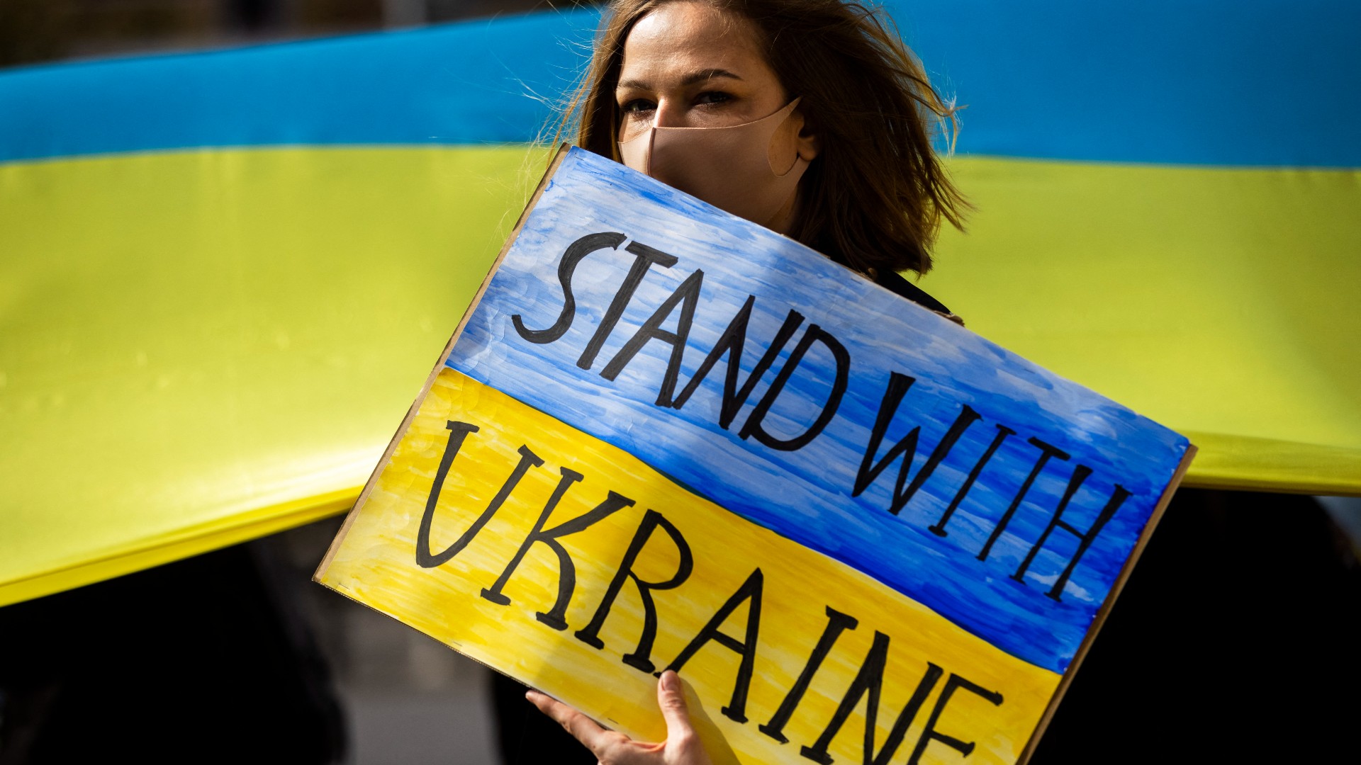 A protester in Tokyo, Japan, denounces Russia's war in Ukraine on 5 March 2022 (AFP)