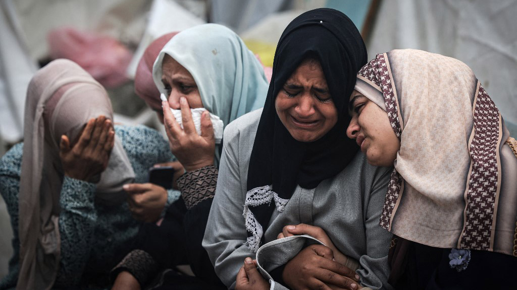 palestine-gaza-israel-strike-mourning-al-maghazi-december-2023