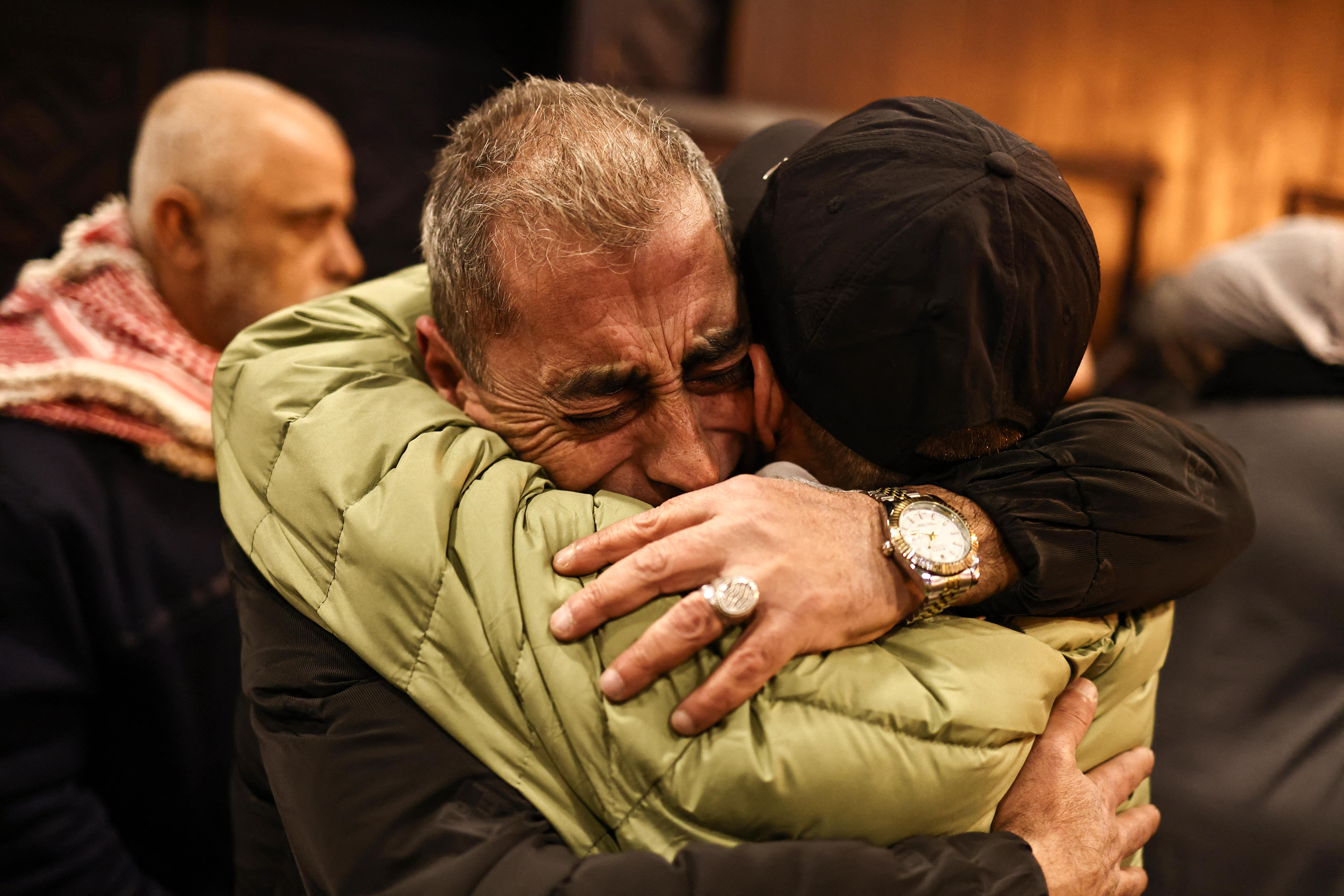 A former Palestinian prisoner is welcomed by relatives upon arrival in the occupied West Bank city of Ramallah on 27 February 2025. (AFP/Zain Jaafar)