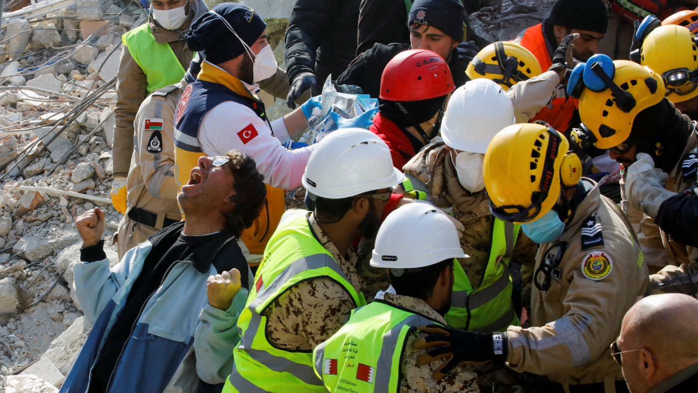 Saadet Sendag celebrates the rescue of his mother after 177 hours under the rubble in Hatay, Turkey (Reuters)