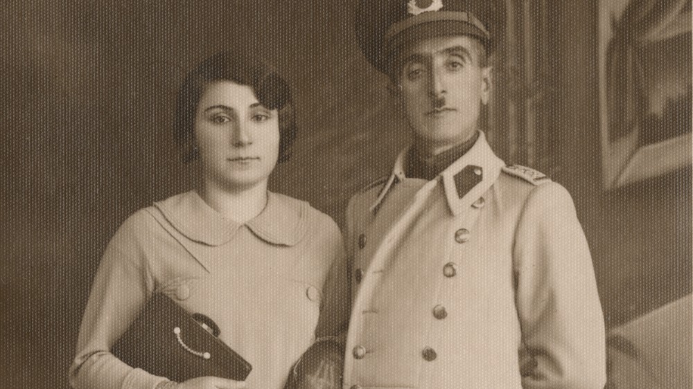 A studio portrait of a couple, circa 1930s. 13.6 × 8.6 cm. Courtesy of Akkasah, the photography archive at al Mawrid, NYUAD (Copyright al Mawrid)