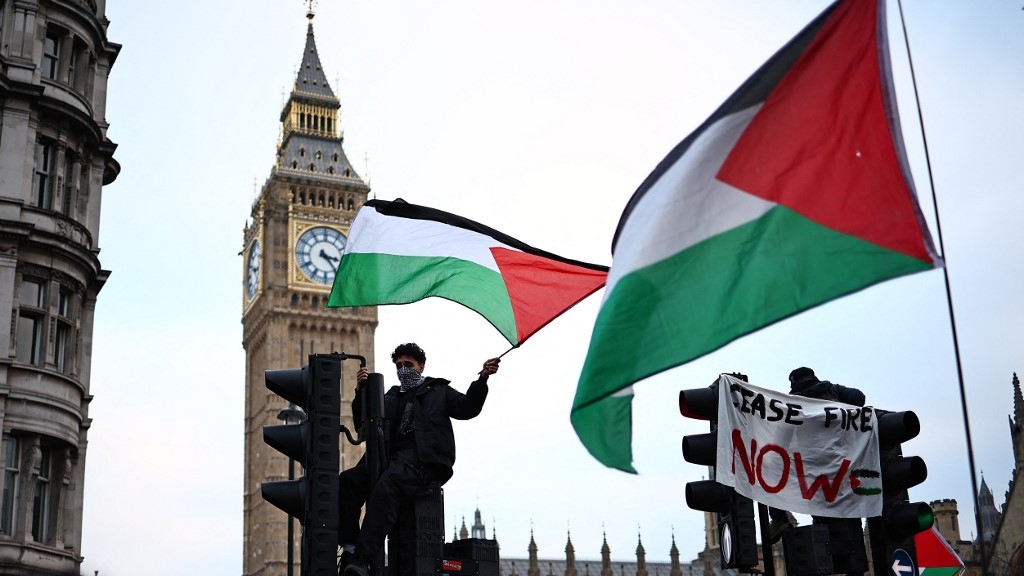 Protesters calling for a ceasefire in Gaza demonstrate outside the Houses of Parliament in London during a demonstration in January 2024 (Henry Nicholls/AFP)