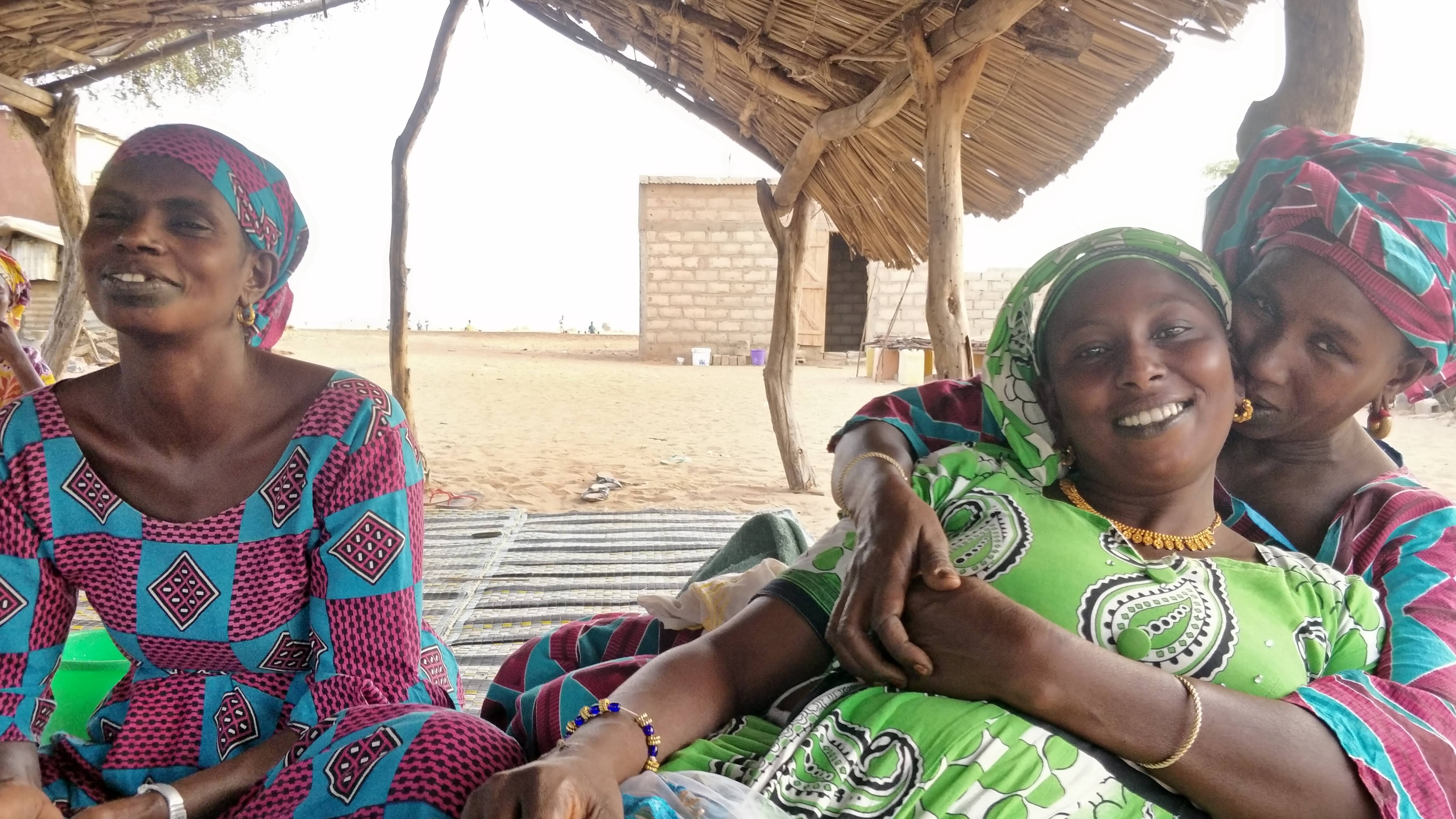 Maimouna Diallo's (centre) first memory is of crossing the river as a child (MEE/Amandla Thomas-Johnson)
