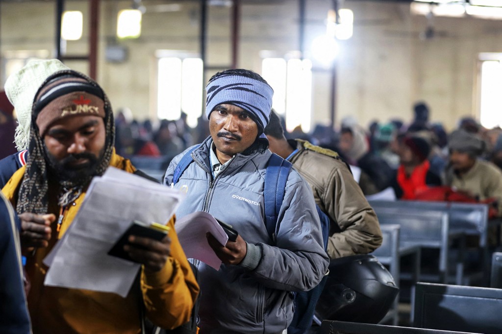 Indian workers align to submit registration forms as they seek employment in Israel during a recruitment drive at the Industrial Training Institute (ITI) in Lucknow, capital of India's Uttar Pradesh state on January 25, 2024. Long lines of Indian men queued on January 25, applying for jobs in Israel as recruiters seek to plug employment gaps with the conflict against Hamas in Gaza now in its fourth month. Naeem ANSARI / AFP
