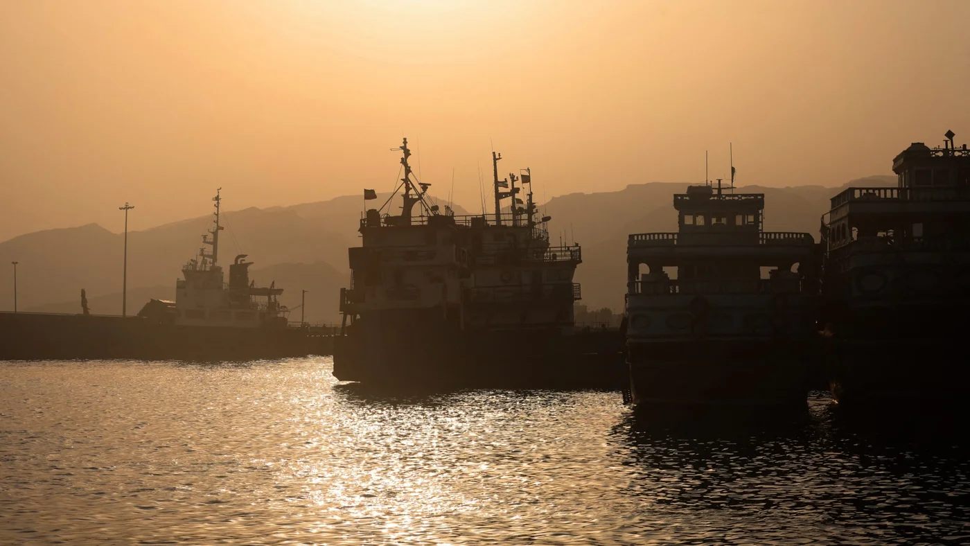 Ships are seen docked at Charak Port in Iran's Hormozgan Province on 9 August 2026 (Atta Kenare/AFP)