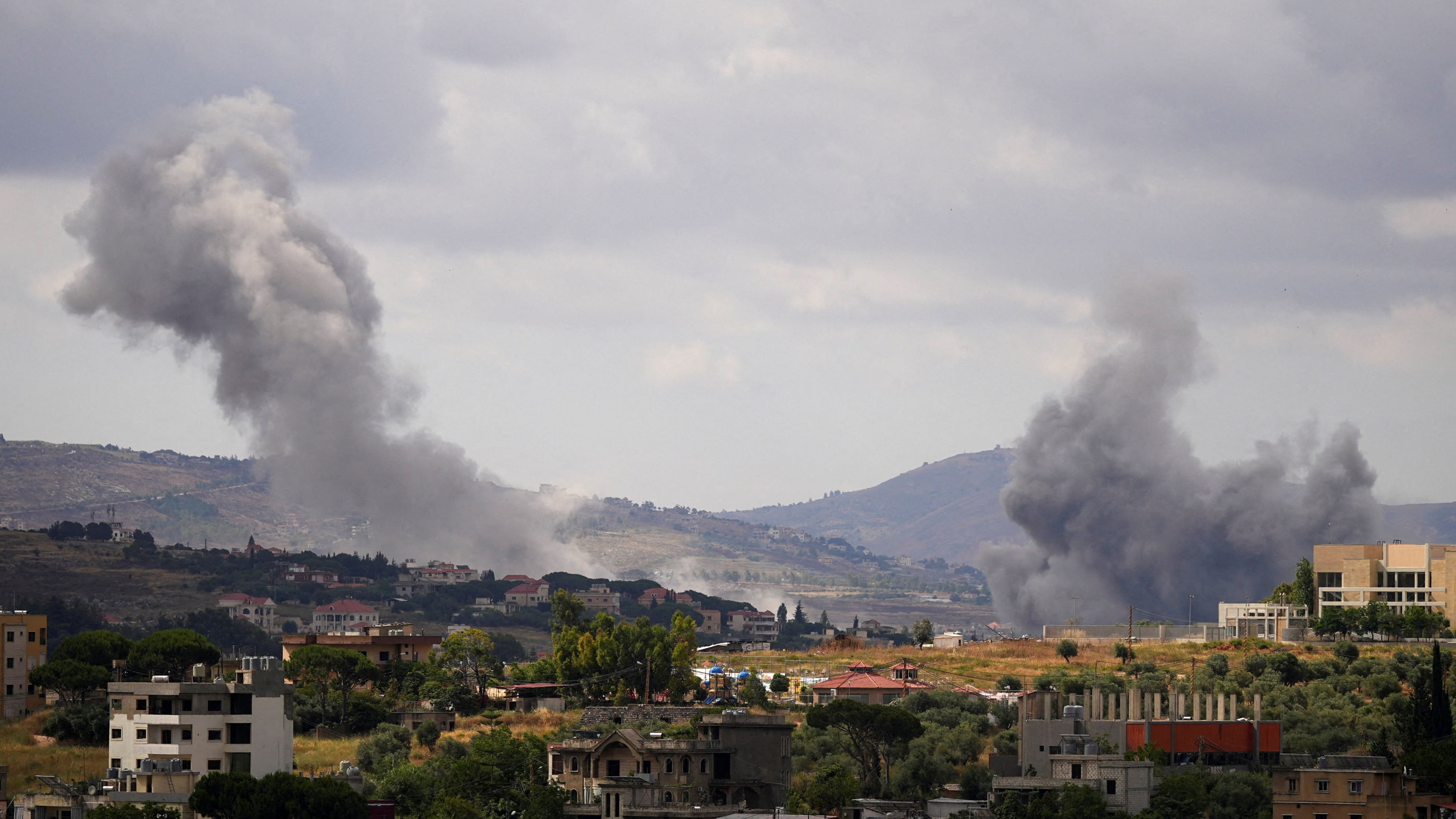 Smoke billows from southern Lebanon, following Israeli strikes, as seen from Nabatieh, 14 June, 2026 (Stringer/Reuters
