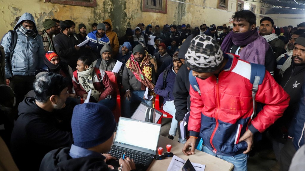 Indian workers gather to seek employment in Israel during a recruitment drive at the Industrial Training Institute (ITI) in Lucknow, capital of India's Uttar Pradesh state on January 25, 2024. Long lines of Indian men queued on January 25, applying for jobs in Israel as recruiters seek to plug employment gaps with the conflict against Hamas in Gaza now in its fourth month. Naeem ANSARI / AFP