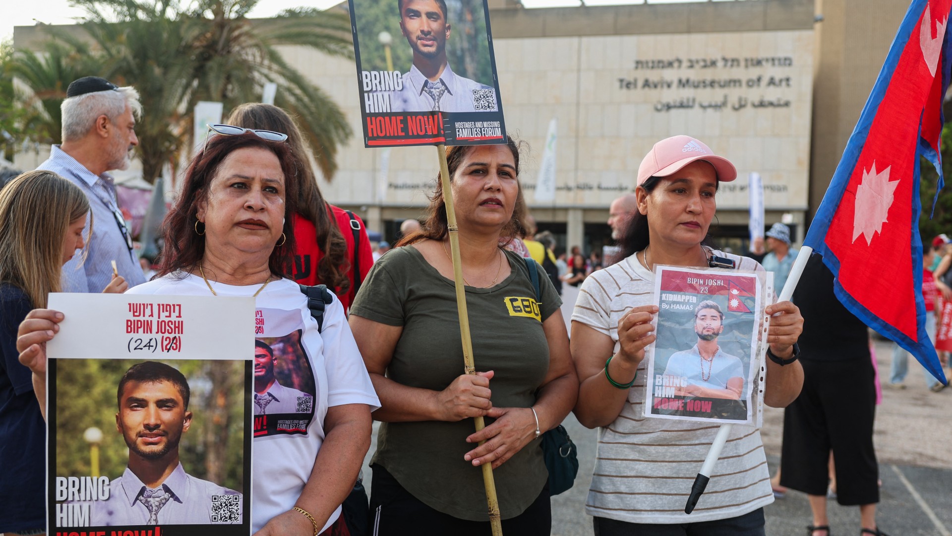 Friends and relatives of Nepalese national Bipin Joshi held hostage by Palestinian militants in Gaza since 2023, attend an demonstration organised by the families of hostages calling for action to secure their release in Tel Aviv on August 16, 2025. After nearly two years with no news of his fate, the family of Nepali agriculture student Bipin Joshi have come to Israel to plead for his release. Jack GUEZ / AFP