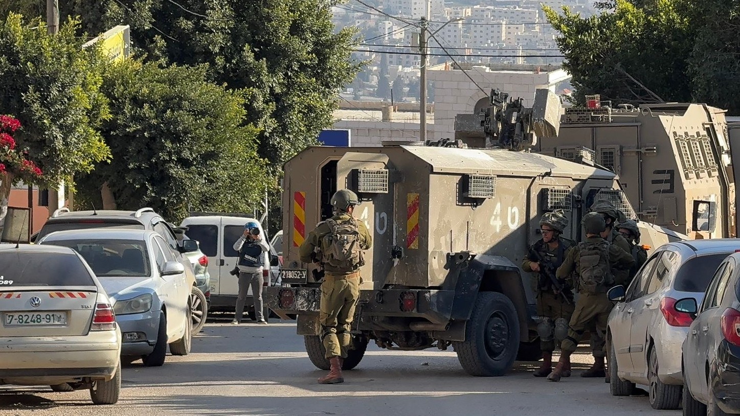 Israeli soldiers outside Turkish hospital in Tubas