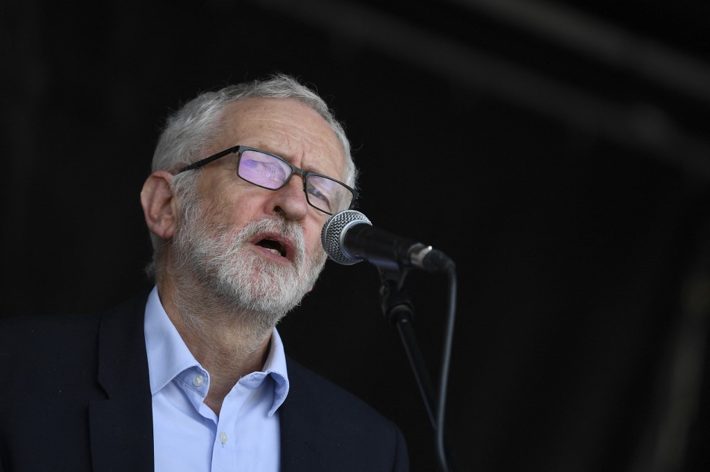 Former British Labour leader Jeremy Corbyn speaks in Brussels on 23 April 2022 (AFP)