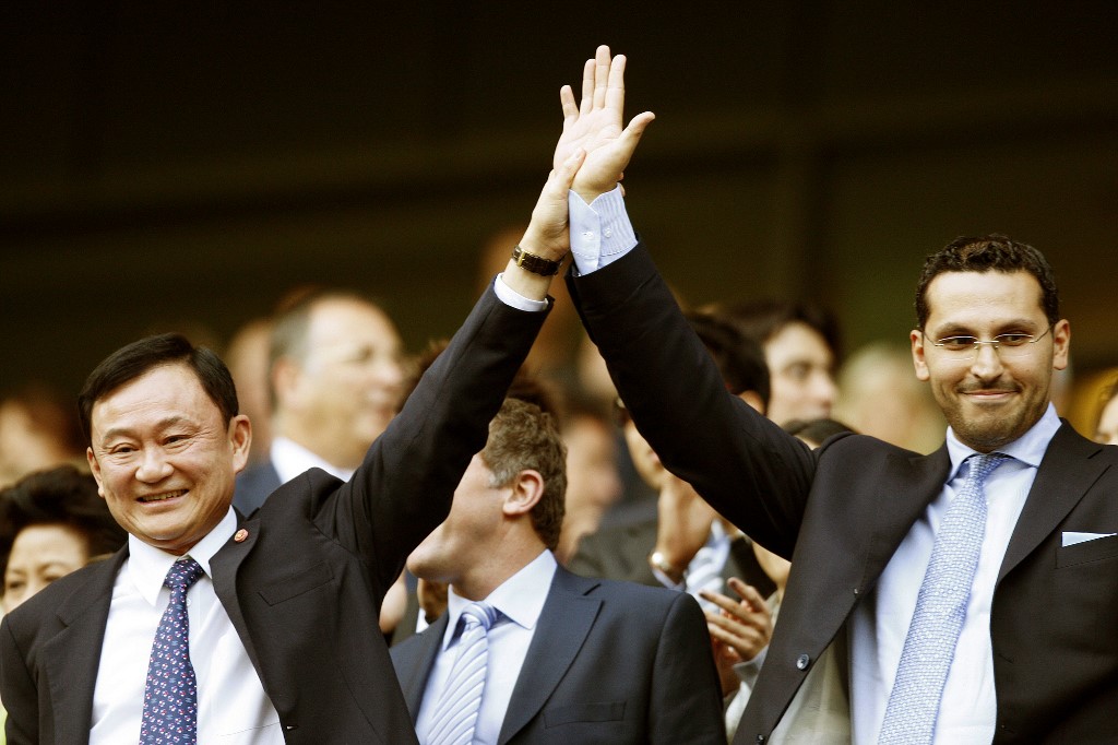 Manchester City's chairman Khaldoon Al Mubarak (right) with former owner Thaksin Shinawatra following Sheikh Mansour's purchase of City (Paul Ellis/AFP)
