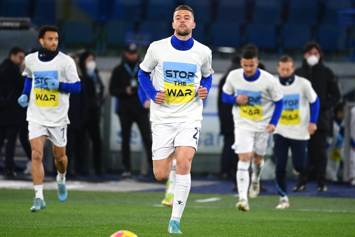 Lazio midfielder Sergej Milinkovic-Savic wears a 'Stop the war' T-shirt referring to Russia's invasion of Ukraine before an Italian Serie A match against Napoli on 27 February 2022.