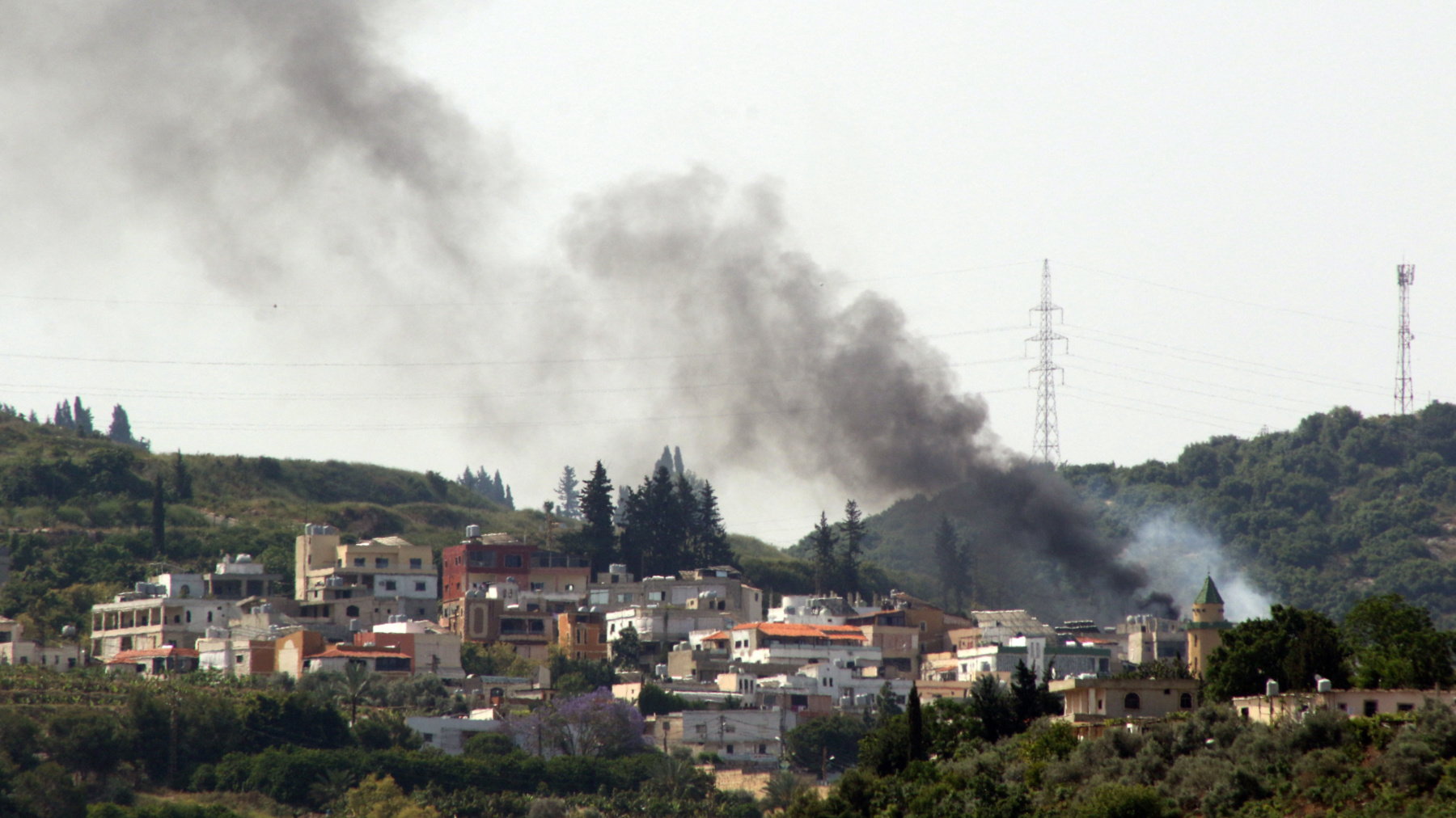 Smoke billows during Israeli bombardment over the Lebanese village of Al-Najjariyeh on 17 May 2024 (Mahmoud Zayyat/AFP)