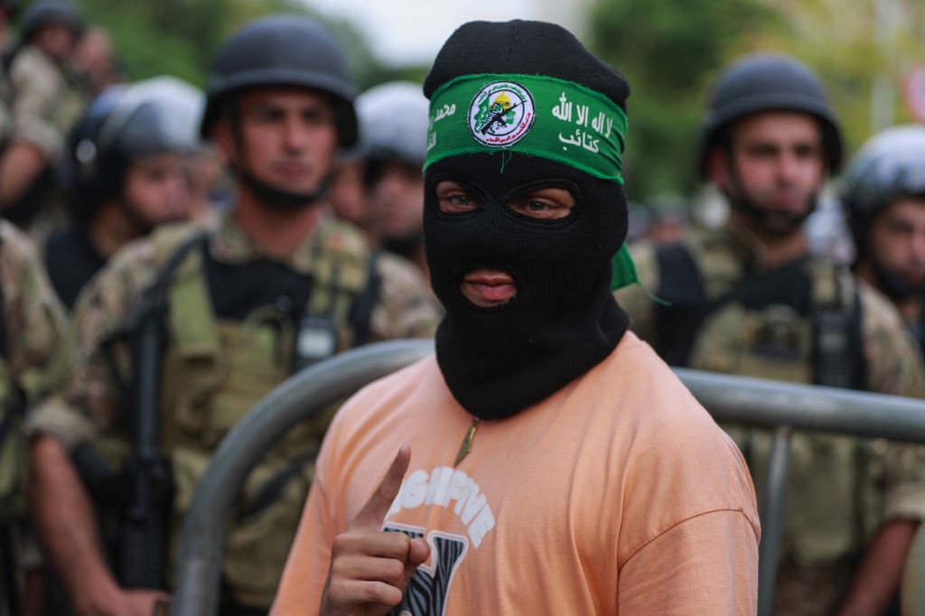 A protester gestures during a rally near the French Embassy in Beirut, on October 31, 2023, in support of Palestinians in Gaza amid the ongoing conflict between Israel and the Hamas movement.