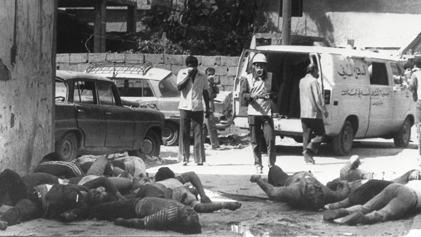 Lebanese civil defence teams prepare to remove the bodies of Palestinians massacred in the Sabra refugee camp in September 1982