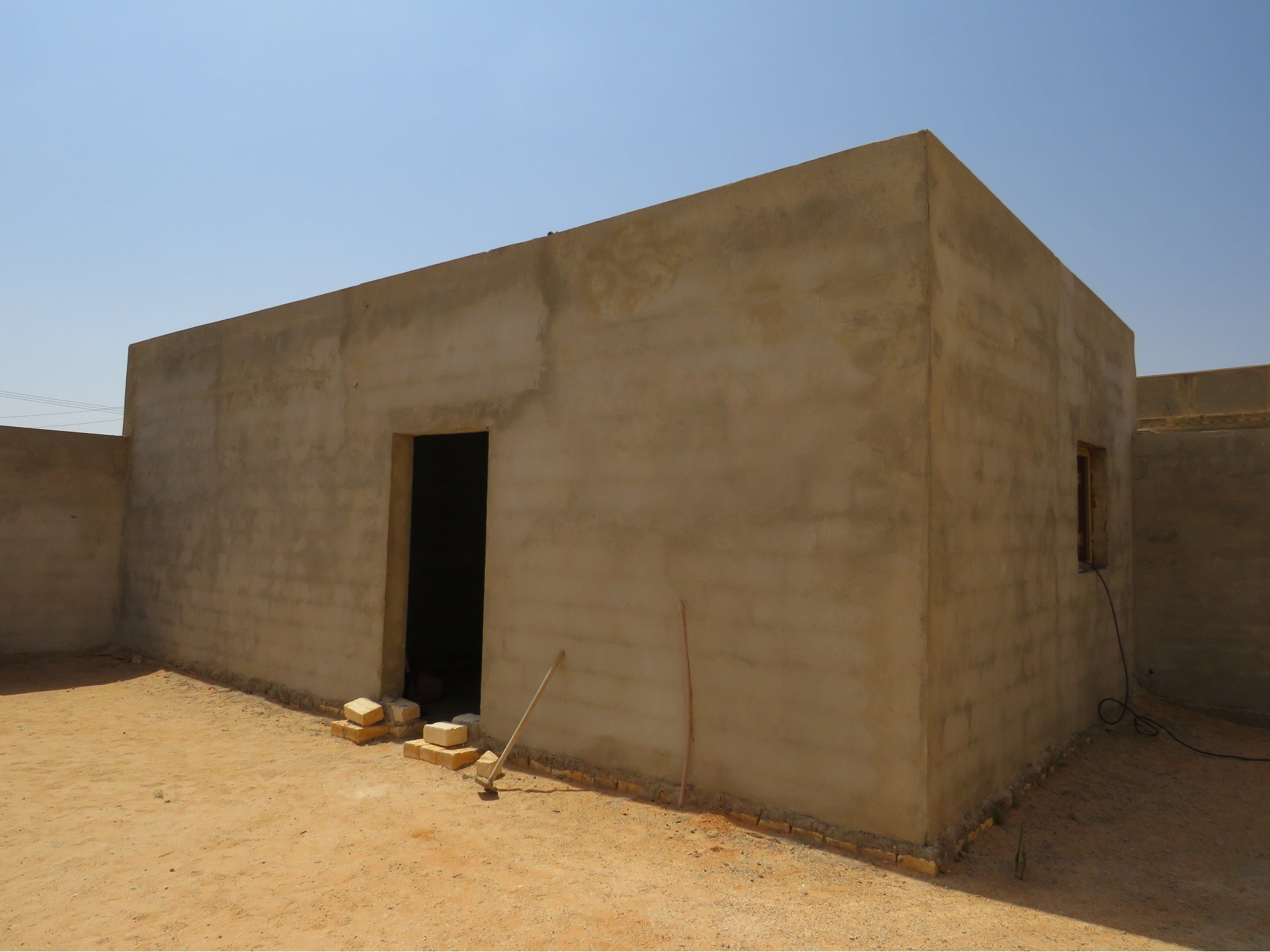 The outhouse where the Enbis family were shot by foreign mercenaries.