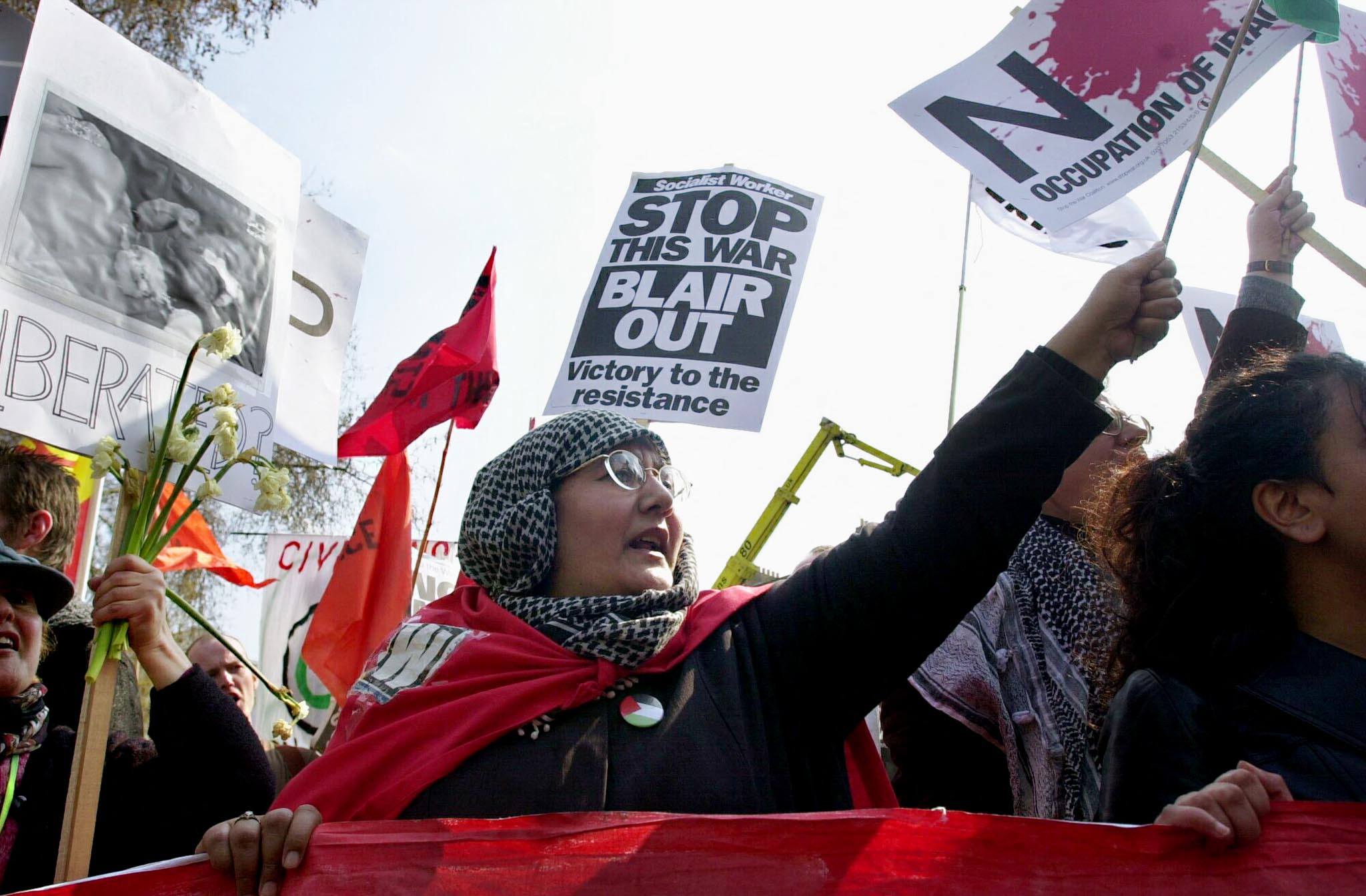 Anti-war demonstrators opposed to military action in Iraq march, in central London 12 April 2003