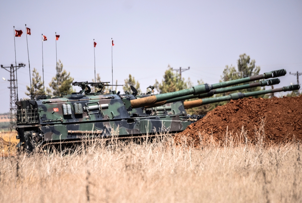 Turkish tanks are seen west of the Turkish-Syrian border town of Karkamis in September 2016 (AFP)