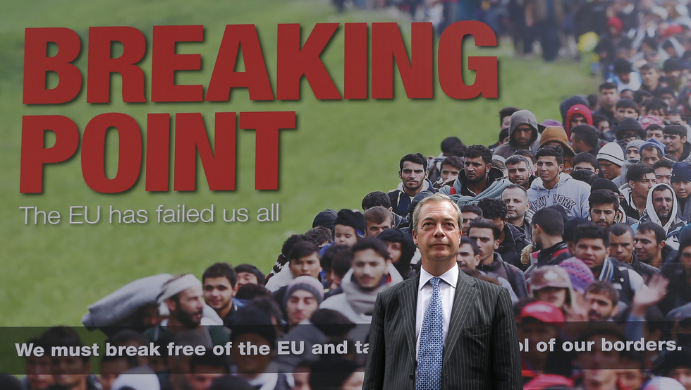 Nigel Farage stands in front of Ukip's infamous 'breaking point' poster in 2016 (BBC)