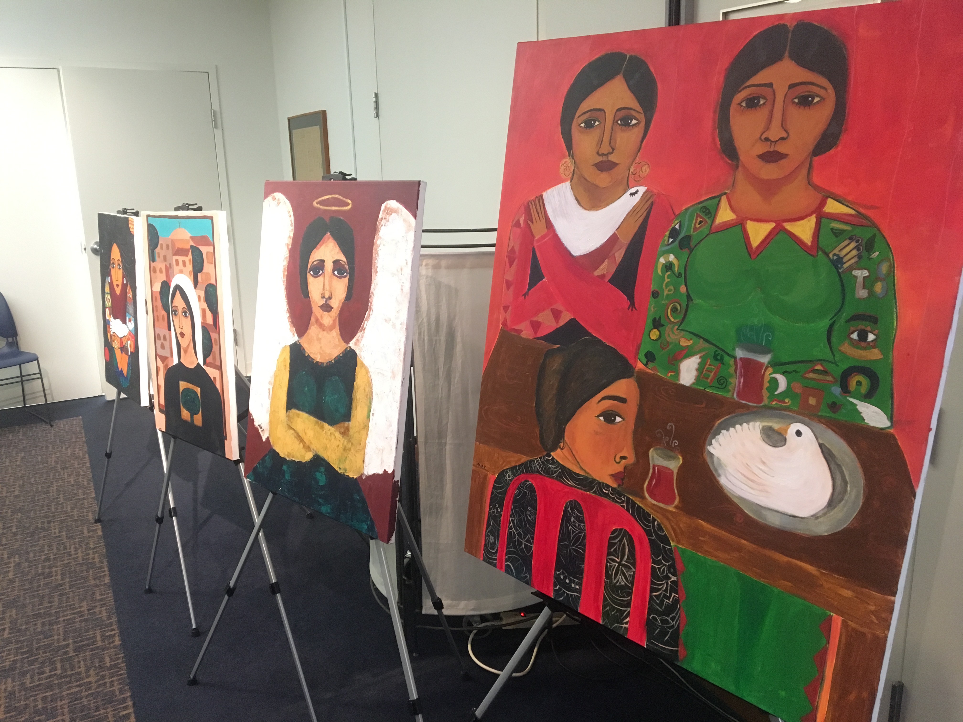 Some of Malak Mattar's work temporarily on display at the Gallery al-Quds in Washington (MEE/Sheren Khalel)