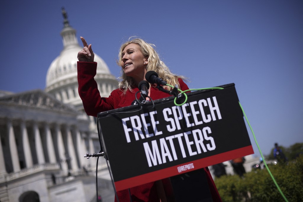 Far-right US Representative Marjorie Taylor Greene speaks about Musk's takeover of Twitter at a news conference in Washington on 28 April 2022 (AFP)