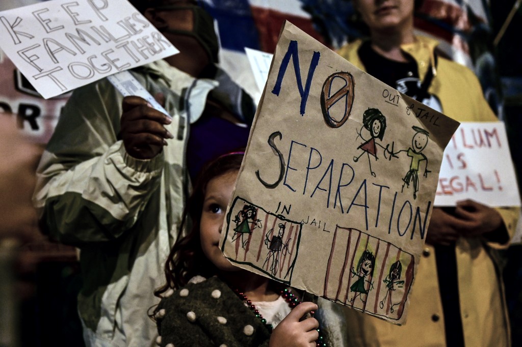 People demand the closure of US migrant detention centres in Mexico City in 2019 (AFP)