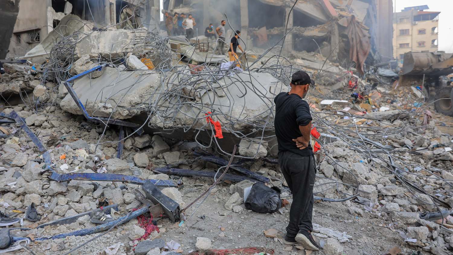 Residents in Gaza reel from an Israeli air strike.