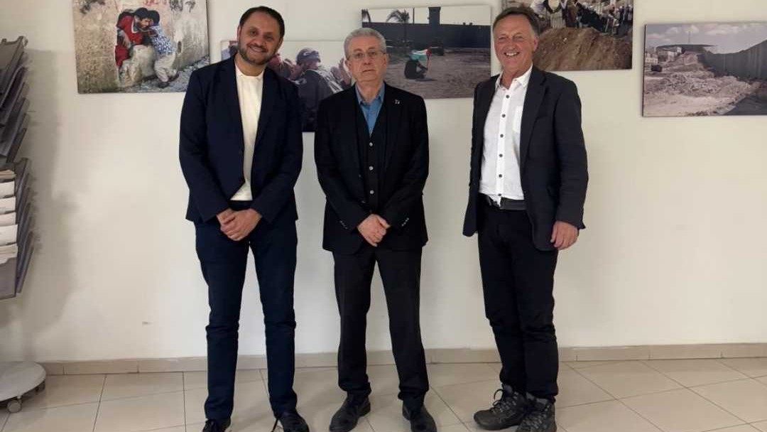 MPs Adam (left) and George (right) meet Mustafa Barghouti, general secretary of the Palestinian National Initiative (centre). (Supplied)