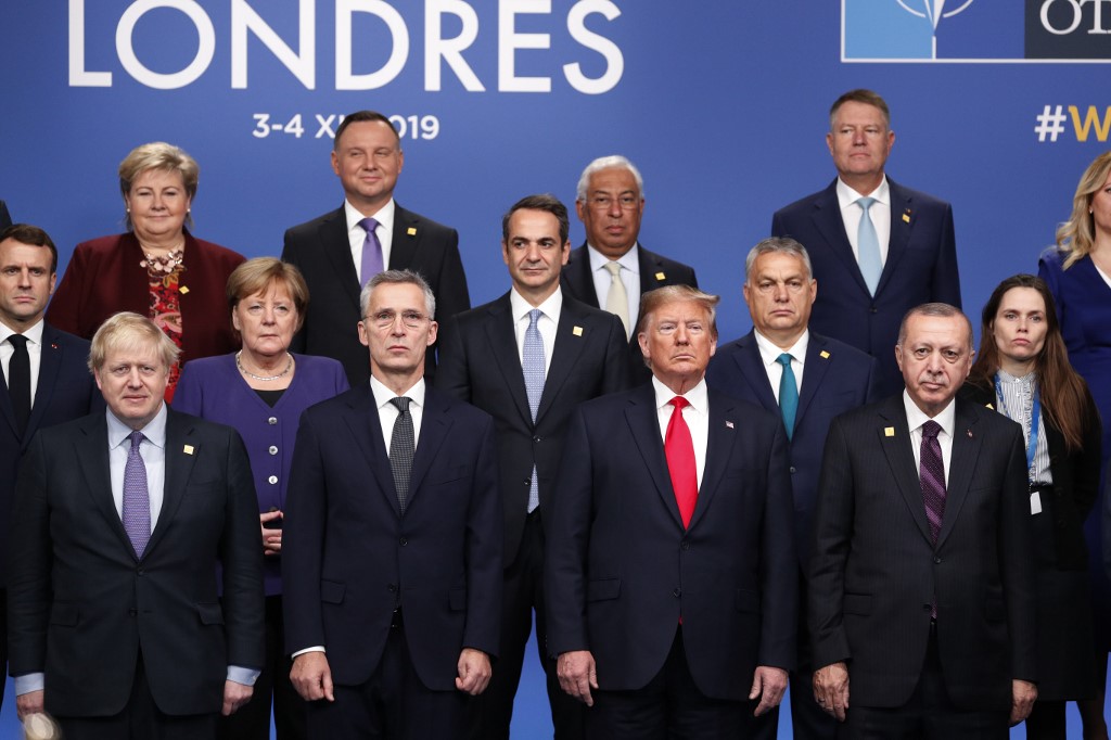 NATO heads of government pose for a group photo in Watford, northeast of London, on 4 December (AFP)