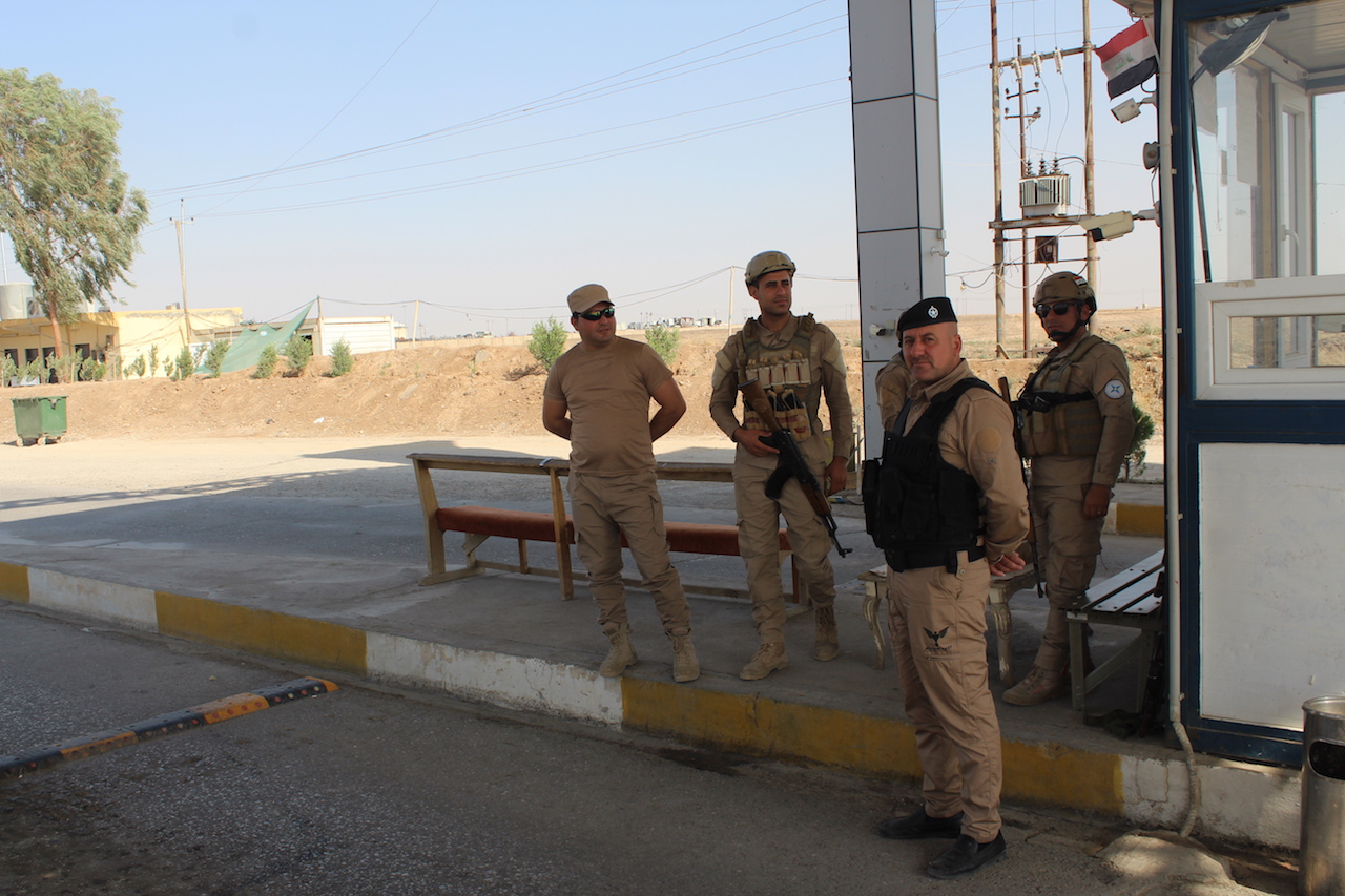 Members of the NPU stand guard (Adam Lucente)
