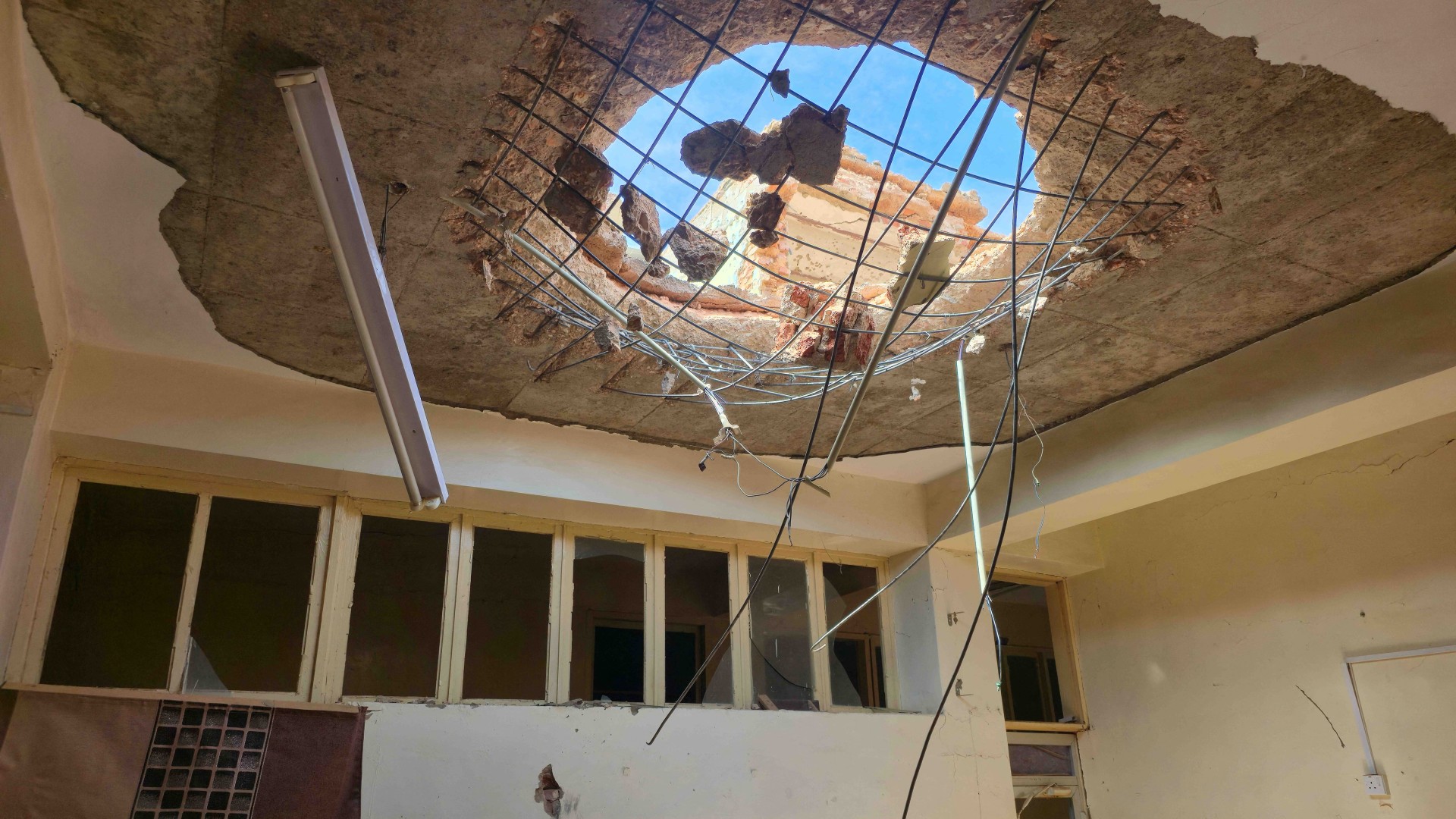 This photograph shows a damaged interior view of the Agricultural Bank of Sudan after it was reportedly targeted by the Rapid Support Forces (RSF) in el-Obeid on 27 July 2026 (AFP)