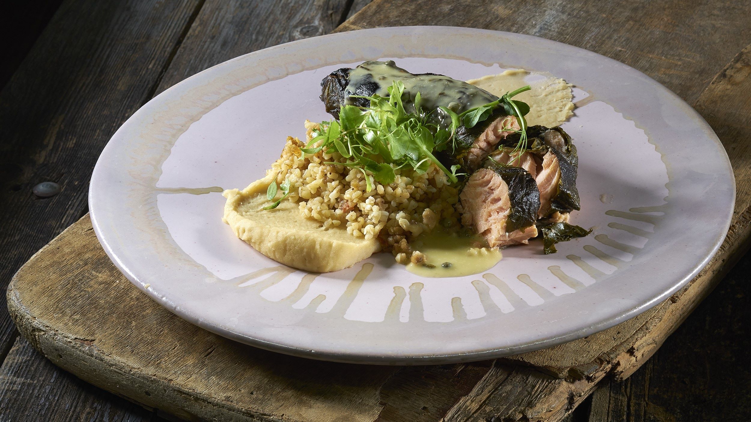 omar-art-of-palestinian-cuisine-salman-wrapped-in-vine-leaf