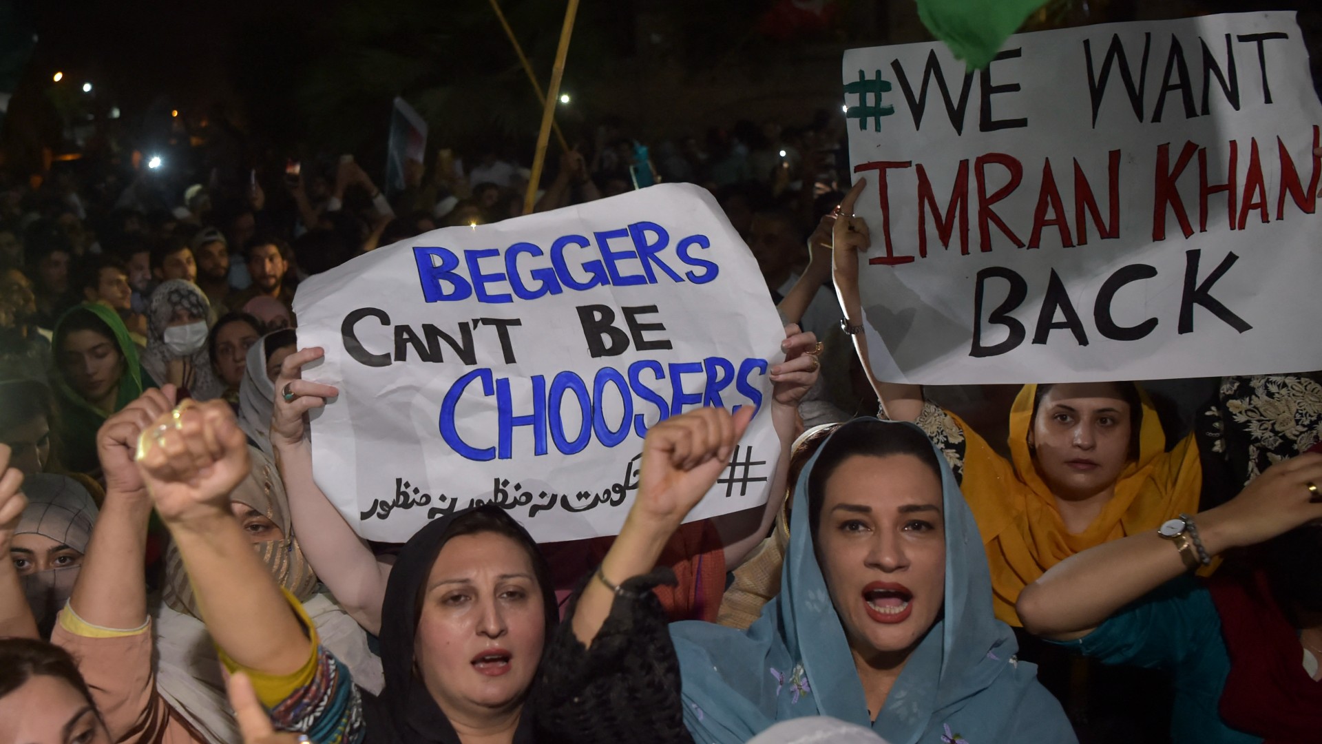 Supporters of Pakistan Tehreek-e-Insaf (PTI) party of dismissed Pakistan's Prime Minister Imran Khan, take part in a rally in his support in Peshawar on April 10, 2022