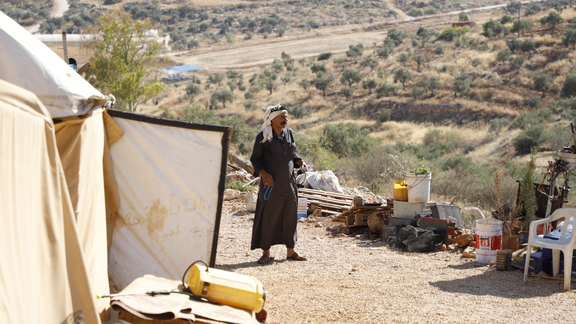 Khairallah Bani Odeh was forced to leave his village after the Israeli military began excavating the lands of Atouf in order to construct a 22-kilometre-long separation wall (Muhammad Ateeq/MEE)
