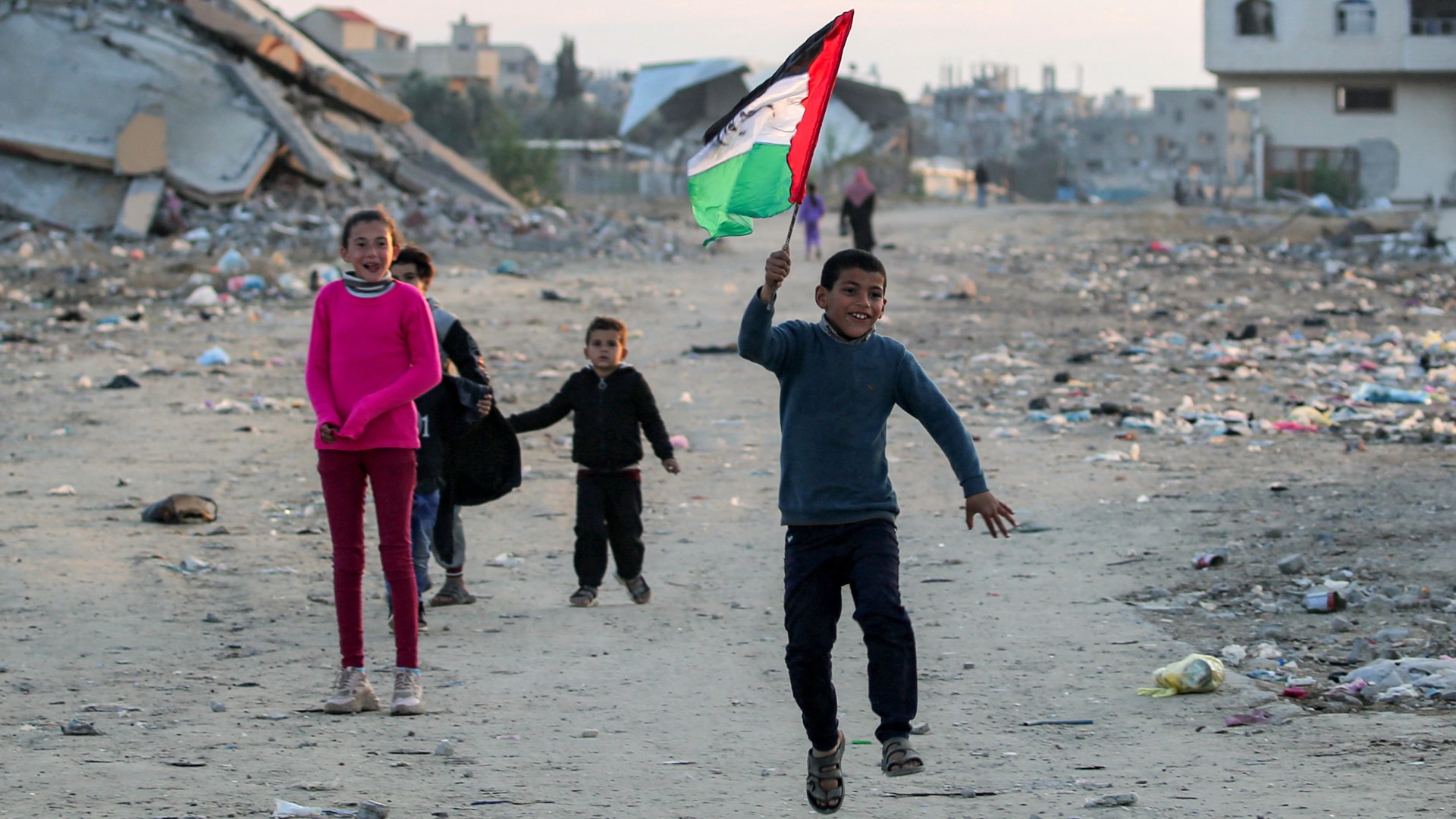 palestine flag boy runs gaza